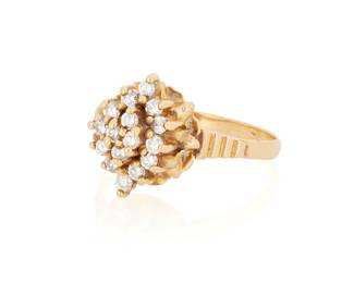 1112
An 18K Gold and Diamond Ring
Featuring a cluster of round diamonds weighing approximately 0.16 carat
Size: 5 1/2
3.3 grams gross
Estimate: $300 - $500