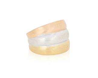 1120
An 18K Tri-Color Gold Ring
Featuring three bands of high polish, yellow, white and rose gold
Size: 7 1/2
2.7 grams
Estimate: $150 - $250