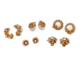 1097
Miriam Haskell: A Group of Vintage Earrings
Featuring four pairs of Miriam Haskell clip earrings in various sizes and motifs including flowers, leaves, and pine cones, as well as a pair of similar style floral pierced earrings, each in gold-toned metal, rhinestones and faux pearls, four pairs signed to clips
10 pieces
Largest: 1 3/8 in. H; smallest: 3/4 in. Dia,.
71.4 grams gross
Estimate: $250 - $350