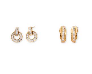 1145
Two Pairs of Gold and Diamond Earrings
Including a pair of 14k gold and diamond half hoops, tother with a pair of 18k gold and diamond disc earrings, signed Carriere
3 pieces
Measures: 3/4 x 1/2 in. and 3/4 x 1/4 in.
13.63 grams
Estimate: $500 - $700