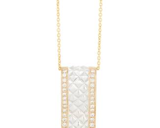 1048
A 14K Bi-Color Gold and Diamond Necklace
Featuring a quilted curved bi-color pendant accented with round diamonds
Length: 17 in., Pendant: 1 x 1/2 in.
6.1 grams gross
Estimate: $400 - $600