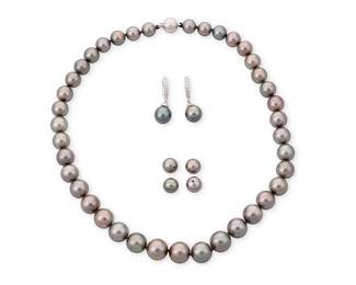 1037
A Group of White Gold and Grey Cultured Pearl Jewelry
Including a necklace, pair of earrings and four extra beads of cultured pearls measuring approximately 8.30-10.50 mm
7 pieces
Necklace: 16 in., Earrings: 1 in.
56.5 grams gross
Estimate: $400 - $600