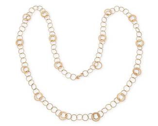 1115
A 14K Gold Necklace
Featuring open gold links with stations of textured gold
Length: 40 in.
13.7 grams gross
Estimate: $700 - $900