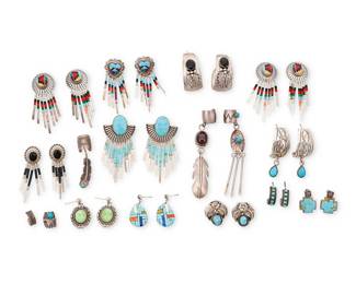 1079
A Group of Southwest-style Silver and Turquoise Jewelry
Seventeen works comprising five pairs of set-stone concho-style earrings with multiple beaded dangles including turquoise, onyx, and multi-stone inlay, together with seven further pairs of earrings in various styles and sizes, with set turquoise, onyx, and multi-stone stone inlay, as well as three ear cuffs with feather motif and beaded dangles, and two plain ear cuffs, variously marked for maker and for sterling
29 pieces
Largest: 3 1/2 in. H; Smallest: 1/2 in. H
129.1 grams gross
Estimate: $200 - $400