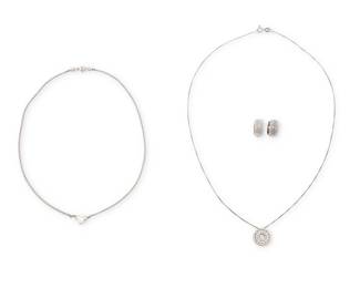 1053
A Group of White Gold, Silver and Diamond Jewelry
Including a 14k white gold and colorless stone necklace, a silver and diamond set necklace with a pair of silver and diamond huggie earrings
4 pieces
Necklaces: 14 in., 18 in., Earrings: 1/2 in.
14.96 grams
Estimate: $700 - $900
