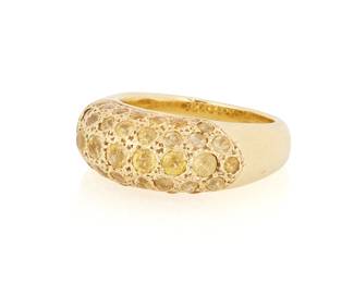 1008
An 18K Gold and Yellow Sapphire Ring
Featuring five rows of graduated yellow sapphires, with French maker's mark
Size: 6 1/2
8.5 grams gross
Estimate: $800 - $1,200