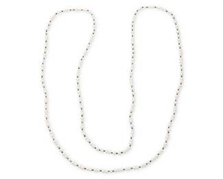 1164
A Cultured Pearl and Black Damond Necklace
A single long strand featuring cultured pearls measuring approximately 5.20-7.00 mm, accented by faceted round black diamonds beads measuring approximately 2.92 carats
Length: 72 in.
96.4 grams gross
Estimate: $300 - $500