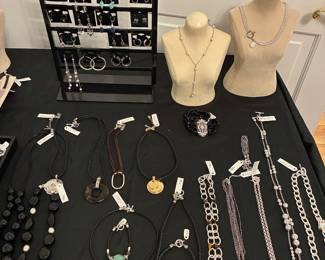 LAUREN BY RALPH LAUREN - designs with details of leather, faux black onyx, colored stones and silver and gold tone details.