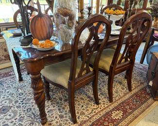 Beautiful Barley Twist Leg Table with 2 leaves and 6 chairs.
