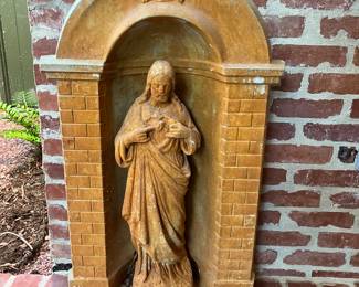 Sacred heart statue in grotto