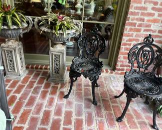 Cast iron chairs, pedestal planters