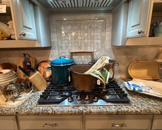 Pots and pans, copper pots, cutting boards, European linens 