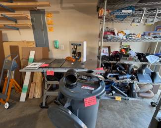 Large collection of dust collection pipes, fittings, connectors and hoses; handmade dust collection can on cart with lid; crown molding materials, corner joints and fittings