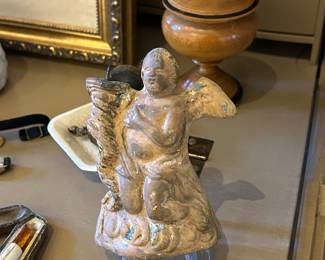 Very old Italian clay cherub candle holder, lucite display