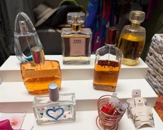 Assortment of perfumes - Yves Rocher Monoi Eau des Vahines, Yves Saint Paurent Champagne, Paris Mademoiselle, Estee Lauder Brasil Dream 