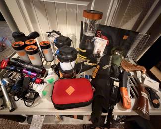 Lighting for camping - flashlights, lanterns, string lights for camp site, variety of knives for camping