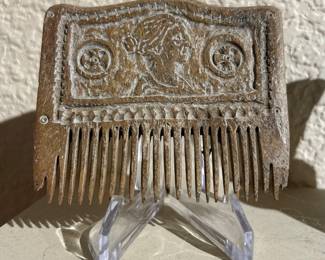 Stone roman hair comb