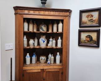 Corner Cabinet with old crocks & ale bottles