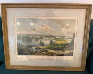 "Fort Edward" By William Guy Wall and engraved by John Hill as part of the 1821-1825 is No. 10 of the Hudson River Port Folio)  The print depicts a peaceful view of the Hudson River at Fort Edward, New York, with grazing cows, rolling hills, and a road in the foreground. It captures a serene landscape, though its title refers to the area's historically significant and strategic military past during the French and Indian War. 