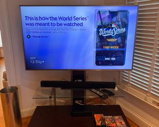 Samsung Smart Tv 55" on stand includes sound bar and stand