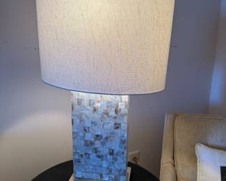 Shimmering mother of pearl tiled body of this lamp is  Perfect for the coastal setting on Tybee 