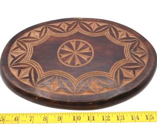 hand carved oval wooden trivet