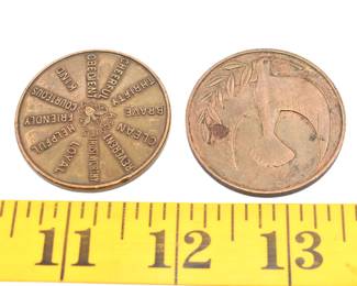 two bronze toned medallions
