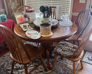 Table has 6 chairs plus leaf