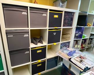 Organizing shelves with storage boxes