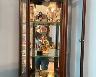 Curio cabinet, collectible figurines