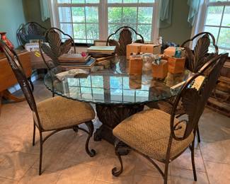Glass top table and six chairs