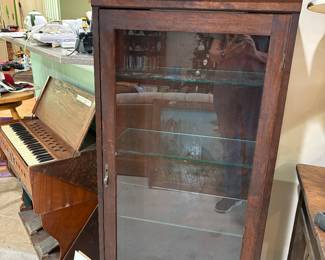 Antique bookcase, mobile organ