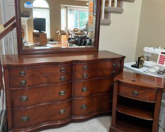 Vintage (breakfront style) dresser with mirror and companion nightstand. Very pristine condition, since we think it is circa 1940.