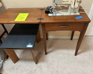 small table underneath. Hand made with black slate (heavy) top. Singer sewing machine (with or without) cabinet.