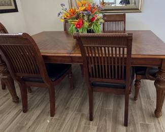 Dining Table with 6 chairs and 1 leaf. 78" long x 44" wide without leaf. I have also included a stock photo from Rooms to Go. Very clean and that photos shows color better. $450