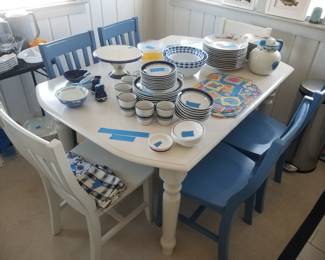 Dishware; dining set seats 6. Includes one leaf, not shown
