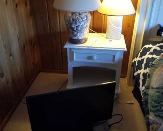 Nightstand & table lamp detail; TV