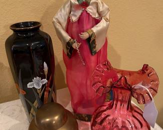Asian doll and Fenton cranberry vase
