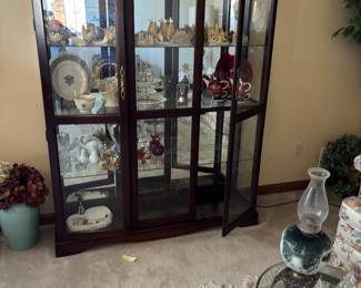 Check out the collectibles in this lovely cabinet