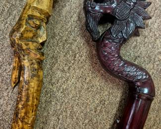 Monkey on man's head cane and dragon head cane