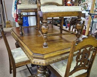 7 pcs. Jacobean walnut dining room set w/ pop-up extra leaf