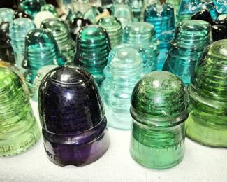 Purple and green insulators