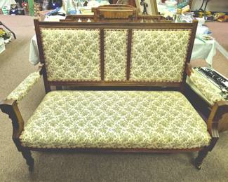 Antique upholstered Eastlake settee