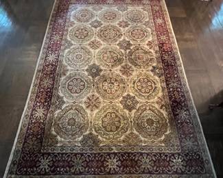34. Red, Tan, and Green Wool Rug (5'9"" x 9')