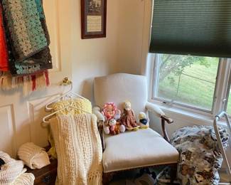 crocheted throws, vintage chair, small trunk