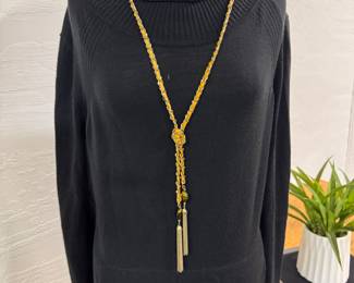 Soft LuLu Lemon Athletica turtle neck with Black and White tiger eye pendant