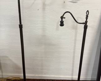 Pair of heavy well made and adjustable floor lamps.
