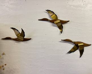 Set of three flying wood and brassy-esk winged geese