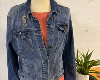 Jean jacket with new eyelet sleeved tshirt and seahorse pin