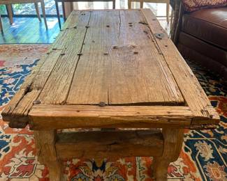 Rustic coffee table with vintage door as the top! SO FUN!